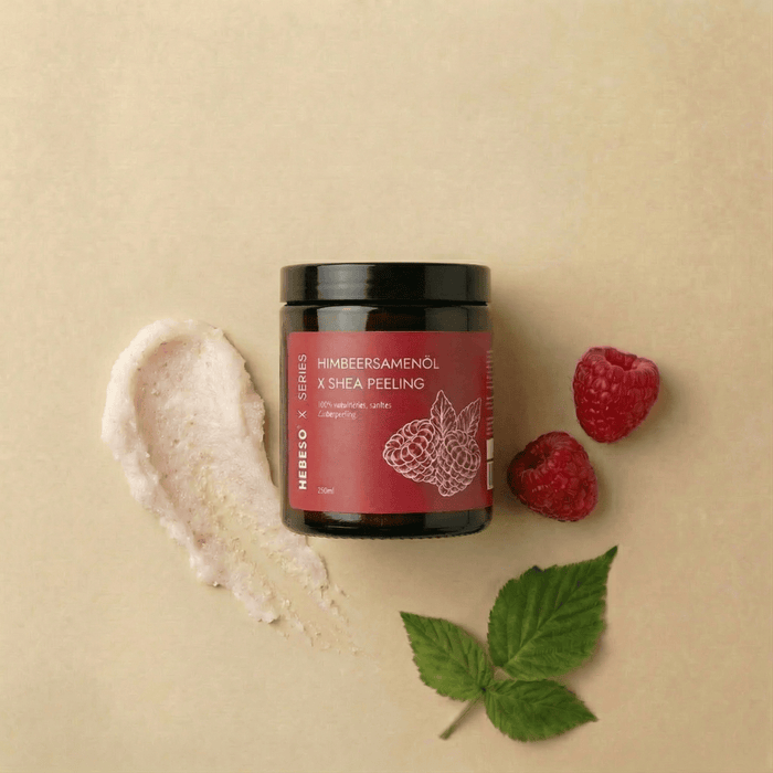 HEBESO Himbeersamenöl Zuckerpeeling 250 ml mit Peelingprobe und Himbeeren.