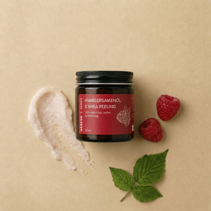 HEBESO Himbeersamenöl Zuckerpeeling 120 ml mit Peelingprobe, Himbeeren und Blättern.